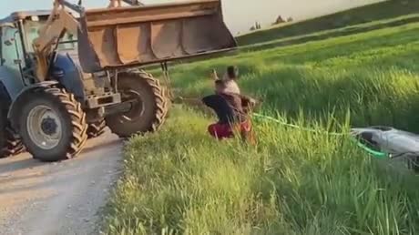 Remorquer une voiture avec un tracteur